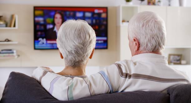 Couple watching TV together